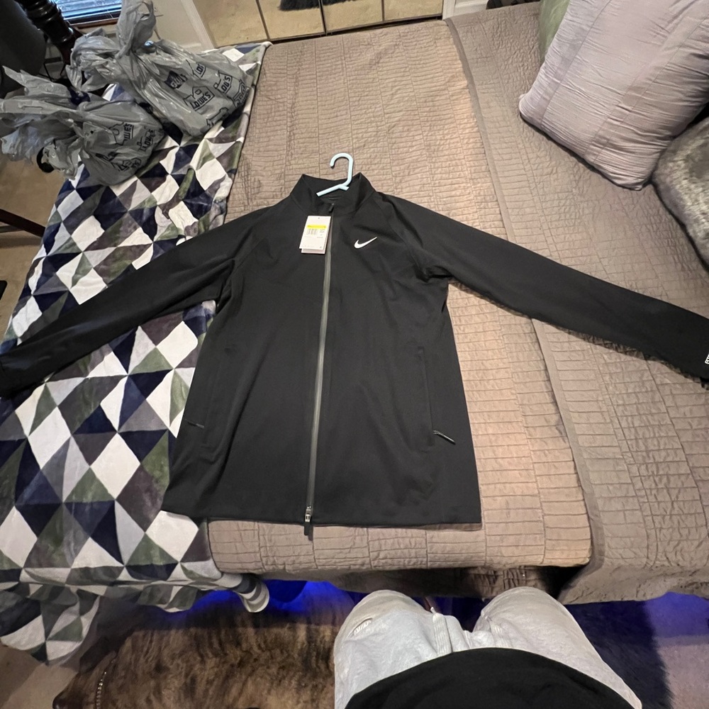 Black Nike Storm-Fit Golf Jacket Waterproof and Windproof brand new never worn.